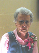 Photo was taken after portrait from sitting. Notice the different expression. This a a gracious wonderful dedicated Church member and community assett